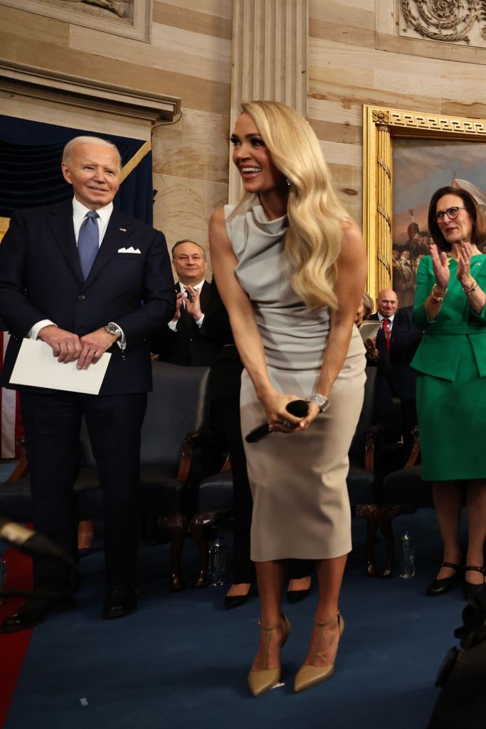  Country music artist Carrie Underwood reacts after performing during inauguration ceremonies in the Rotunda of the U.S. Capitol on January 20, 2025 in Washington, DC. Donald Trump takes office for his second term as the 47th president of the United States.