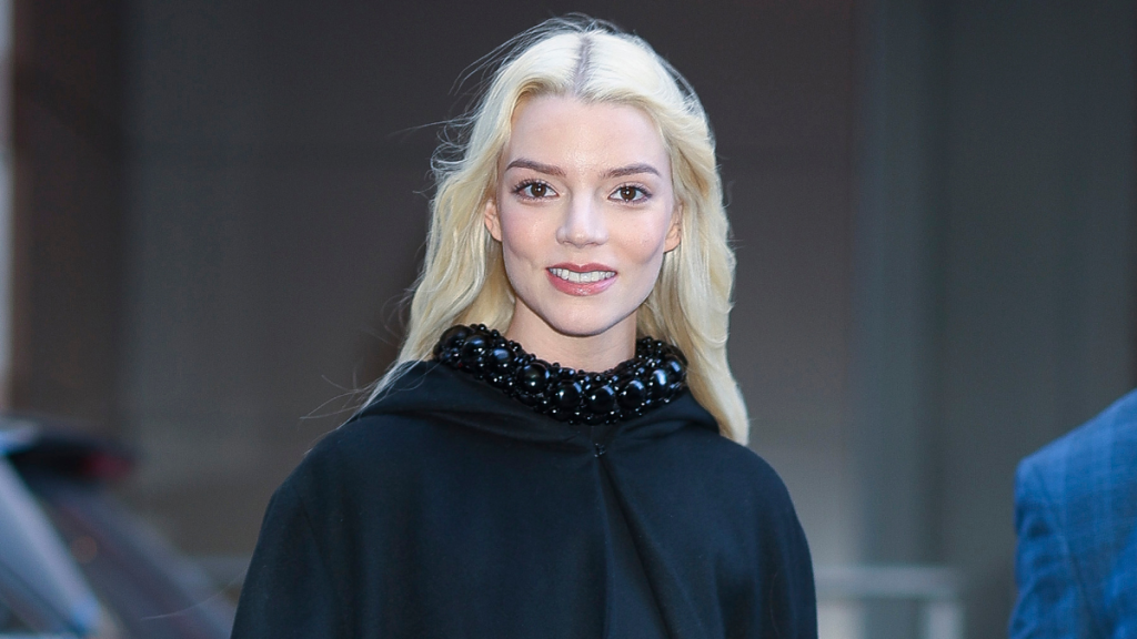 Anya Taylor-Joy NYC photos cape jacket black outfit